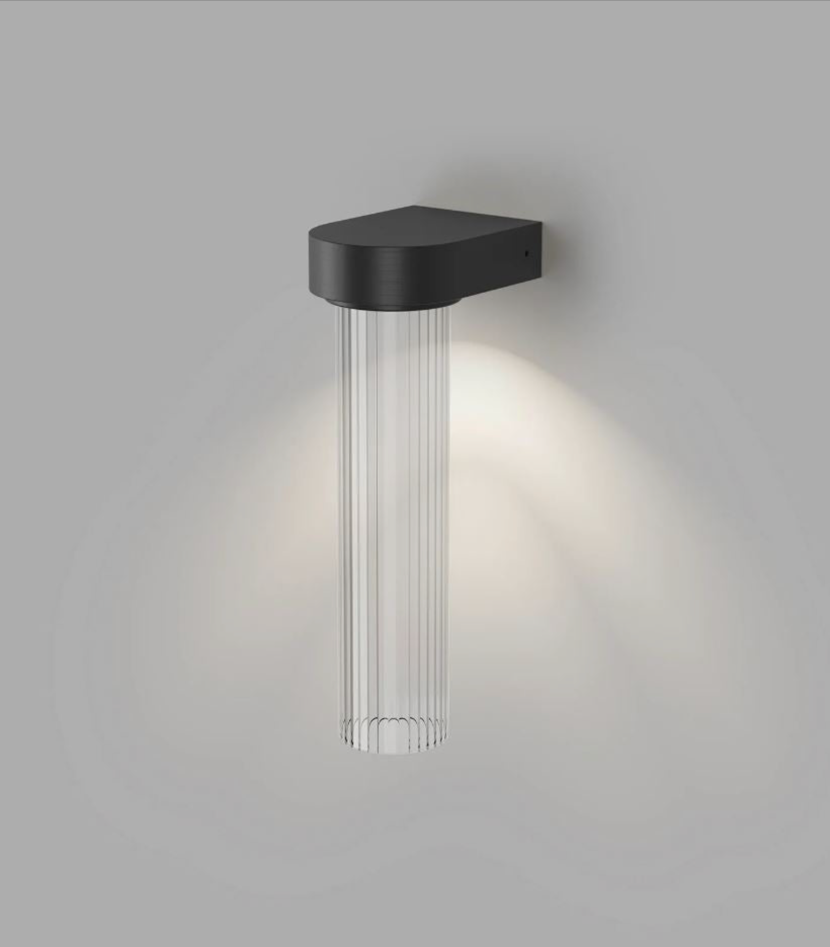 Modern wall-mounted light fixture on a grey background