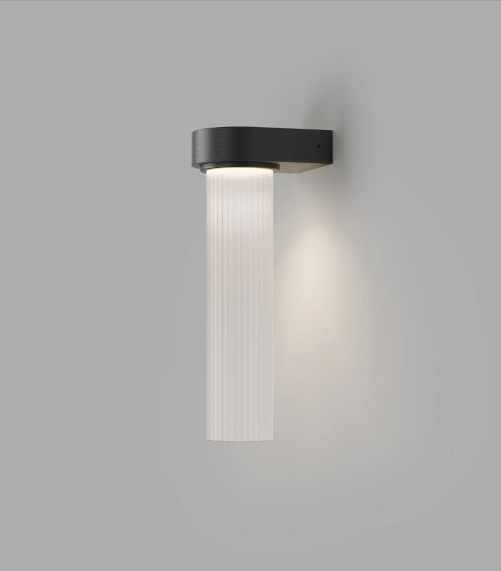 Modern wall-mounted light fixture with ribbed white glass shade on a grey background