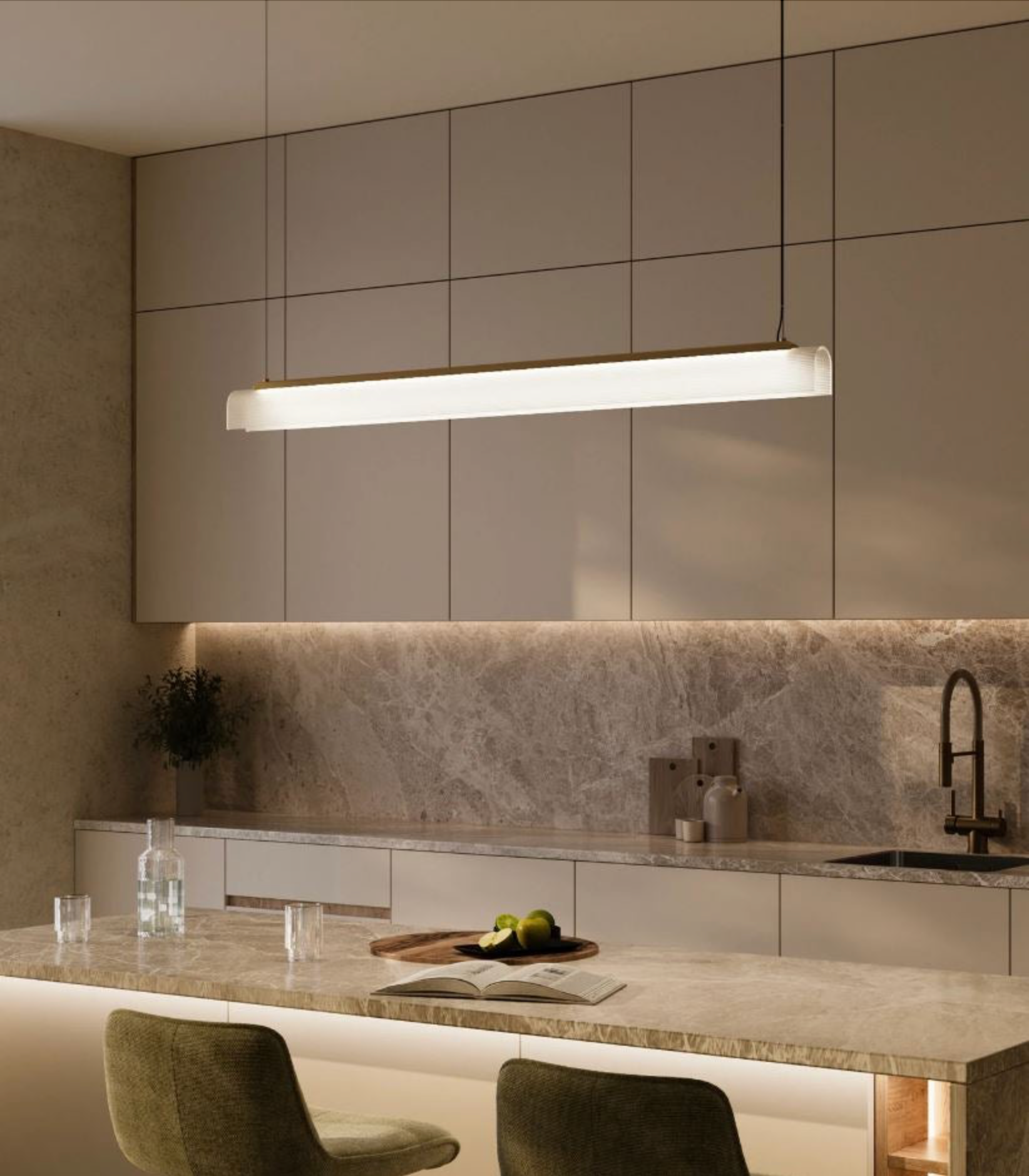 Modern kitchen with a long linear pendant light fixture above the countertop.