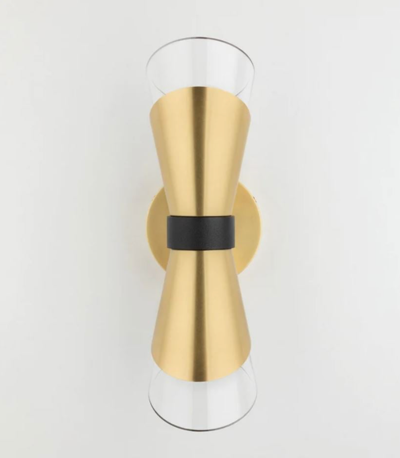 Gold wall sconce with a black band on a white background