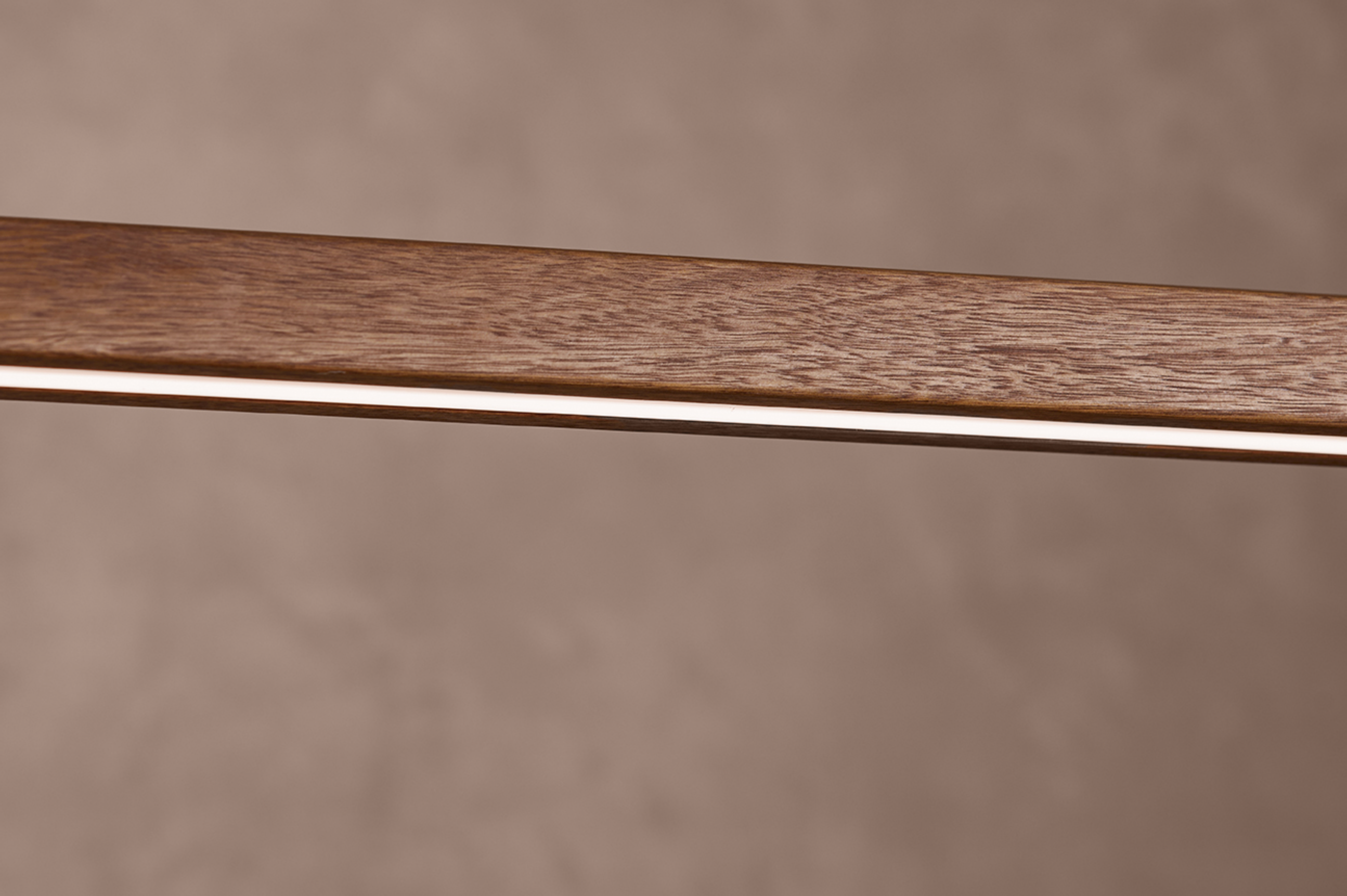 Close-up of House linear pendant light LED strip along Australian hardwood timber body