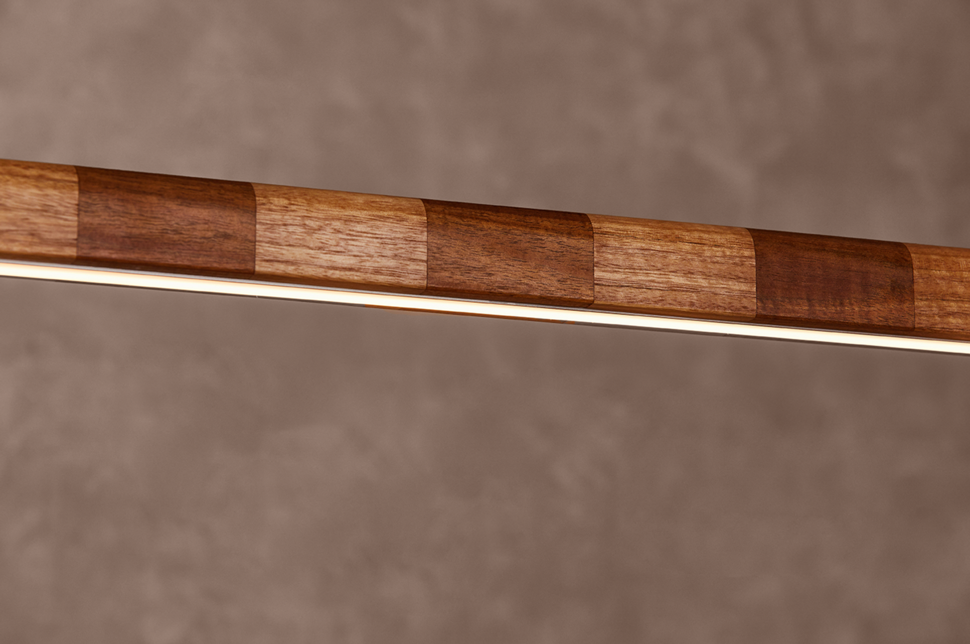 Close-up of Kich pendant light LED strip along striped Australian hardwood timber body – dimmable 3000k