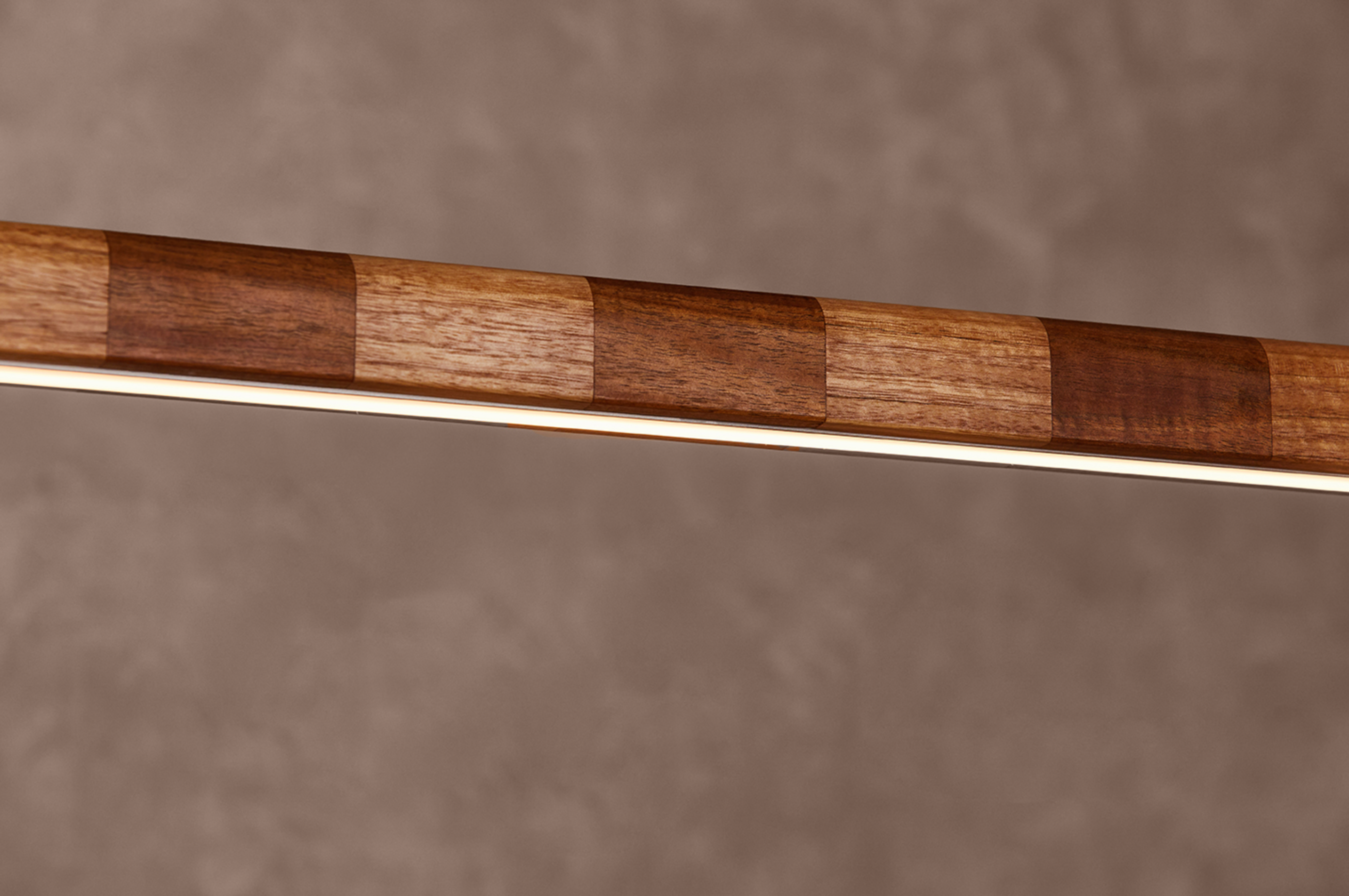Close-up of Kich pendant light LED strip along striped Australian hardwood timber body – dimmable 3000k