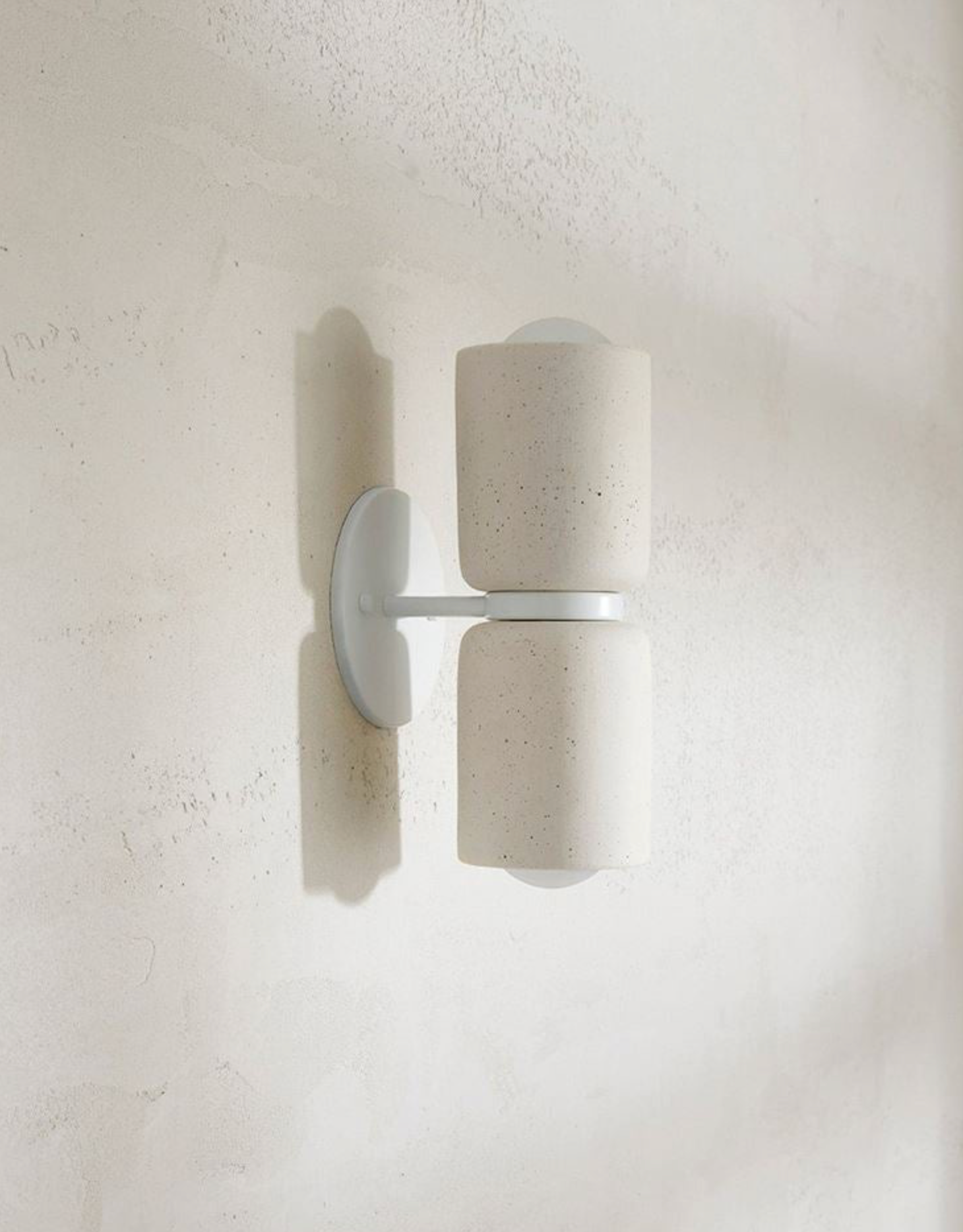 Modern wall light fixture on a white wall