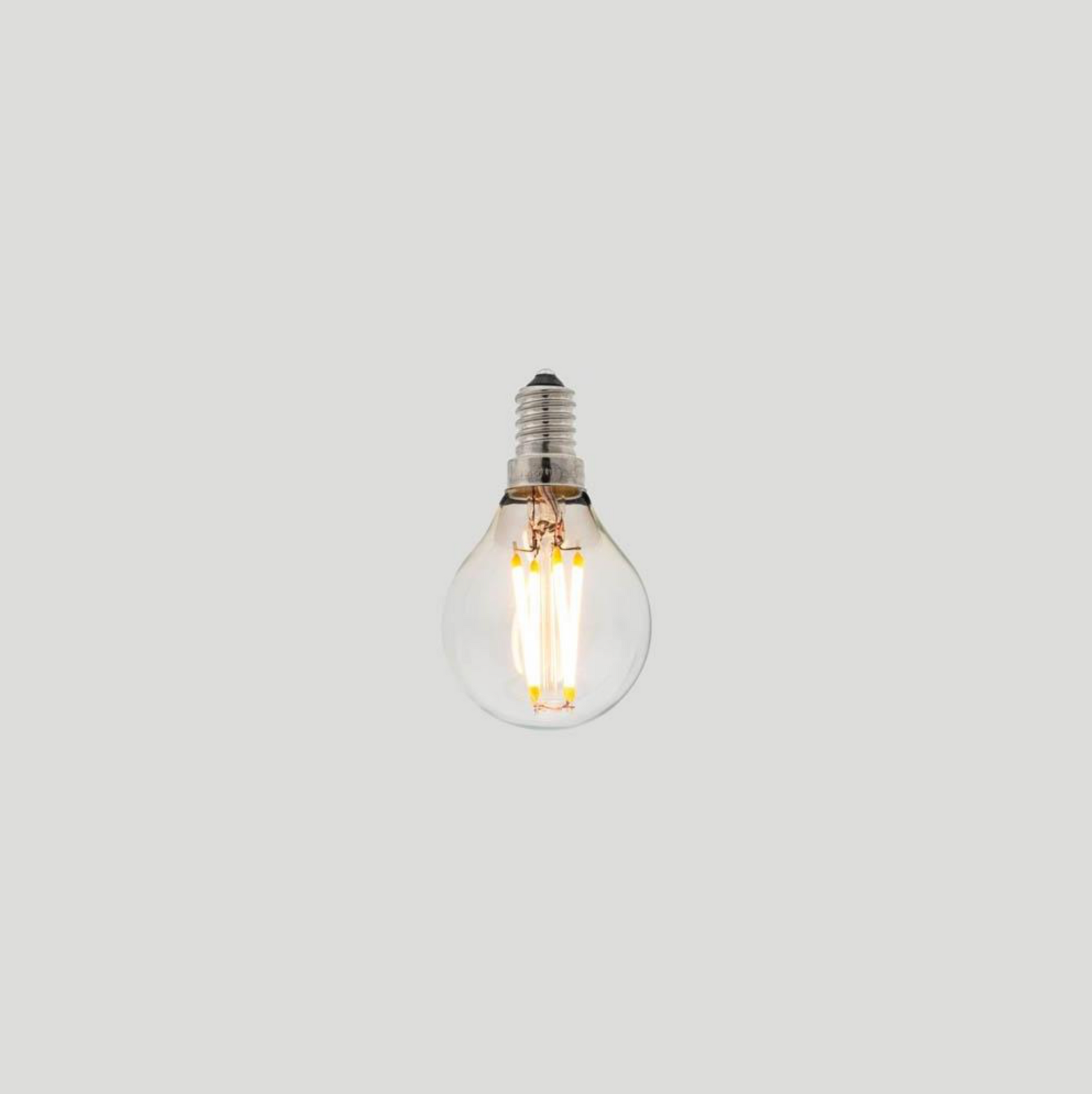 Clear LED light bulb on a white background