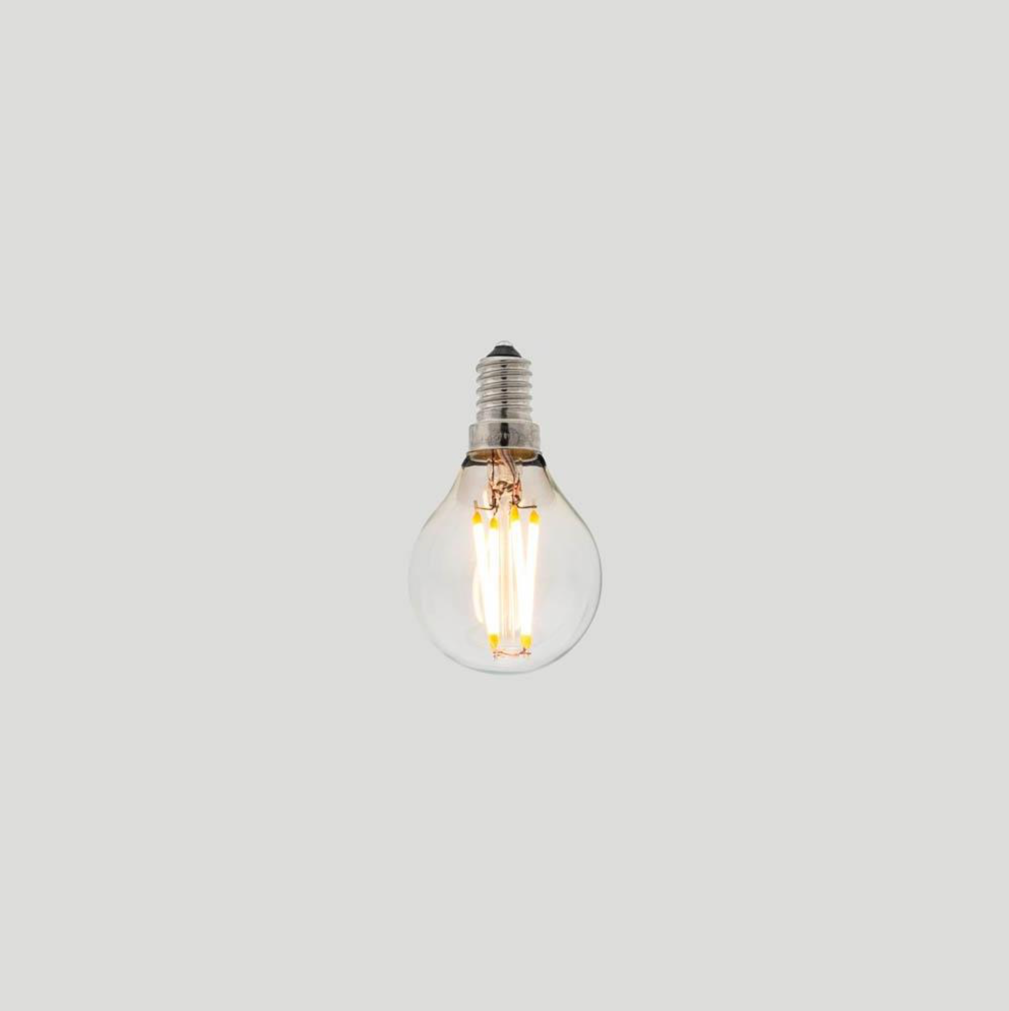Clear LED light bulb on a white background