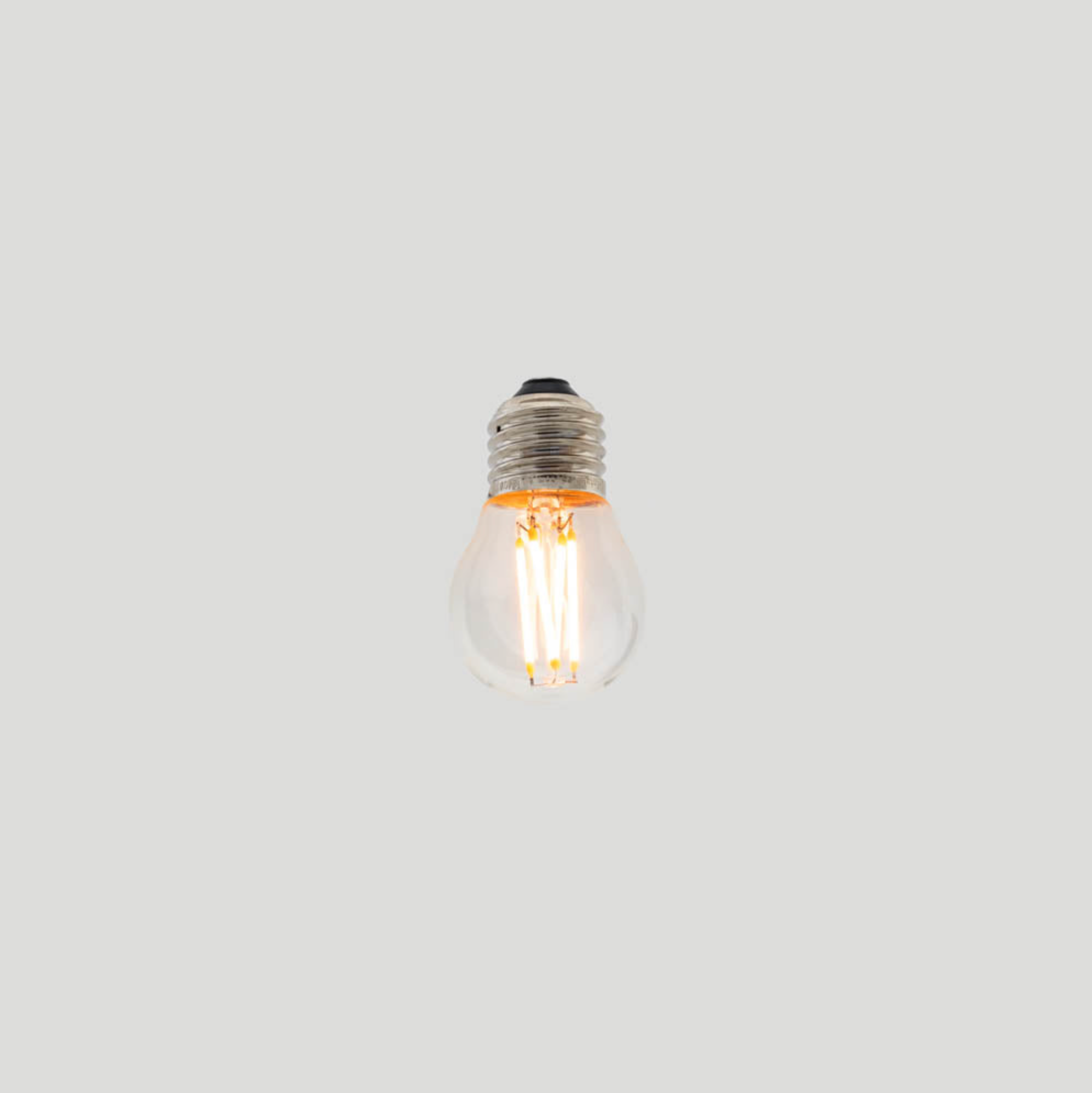 Clear light bulb on a white background