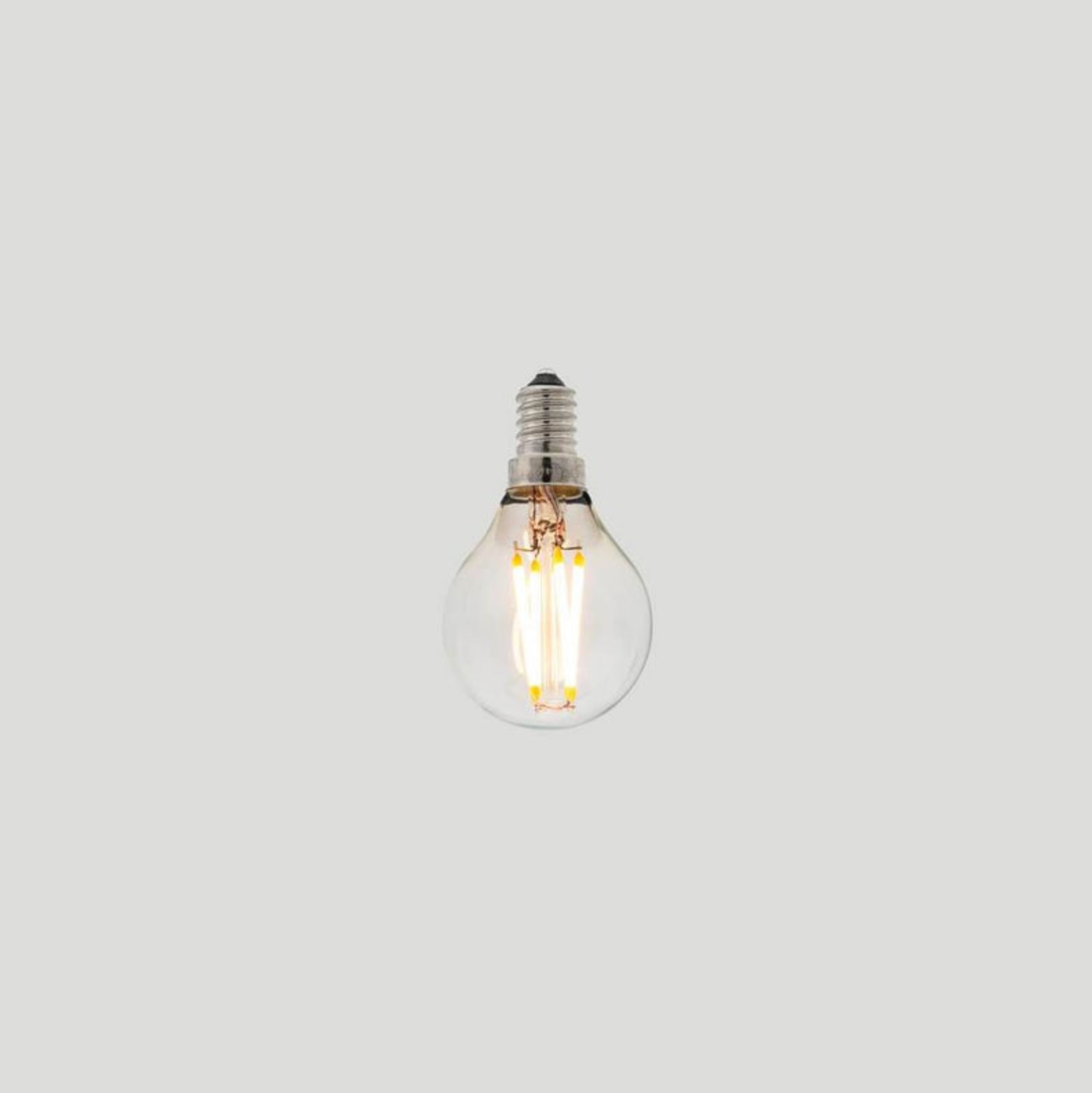 Clear light bulb on a white background