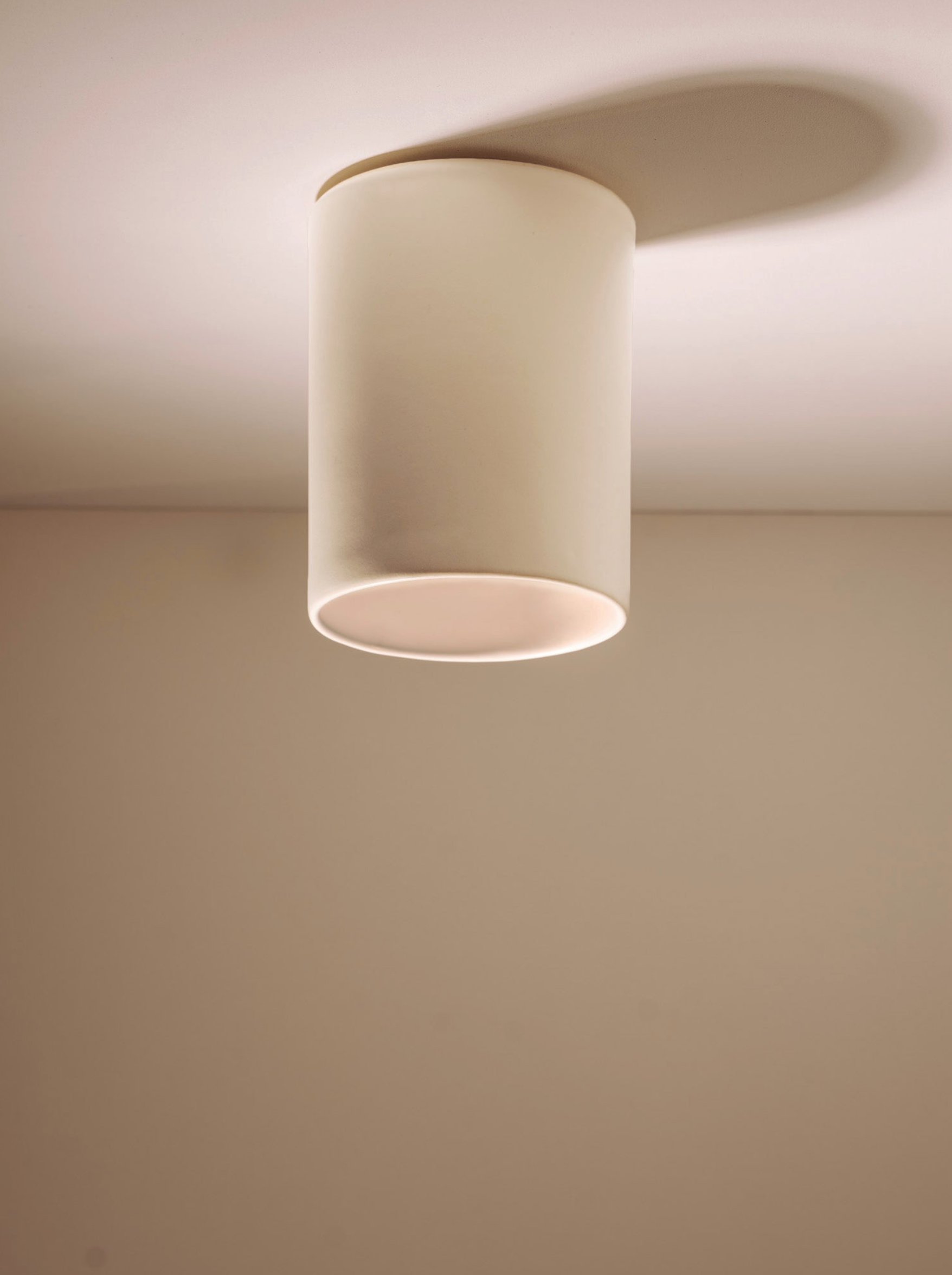 Ceiling light fixture on a plain wall