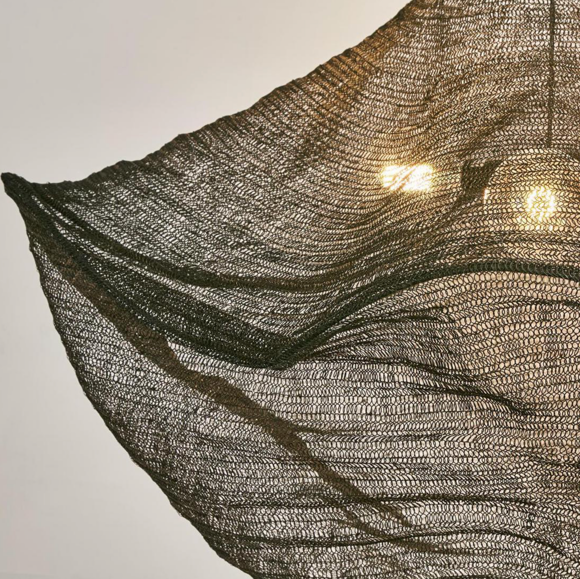 Close-up detail of California Pendant Light woven brass mesh shade texture – Emac & Lawton