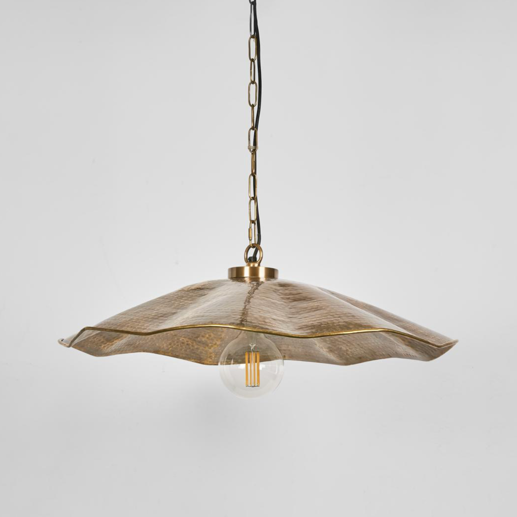 Melville Pendant Light hammered brass on plain wall – Emac & Lawton